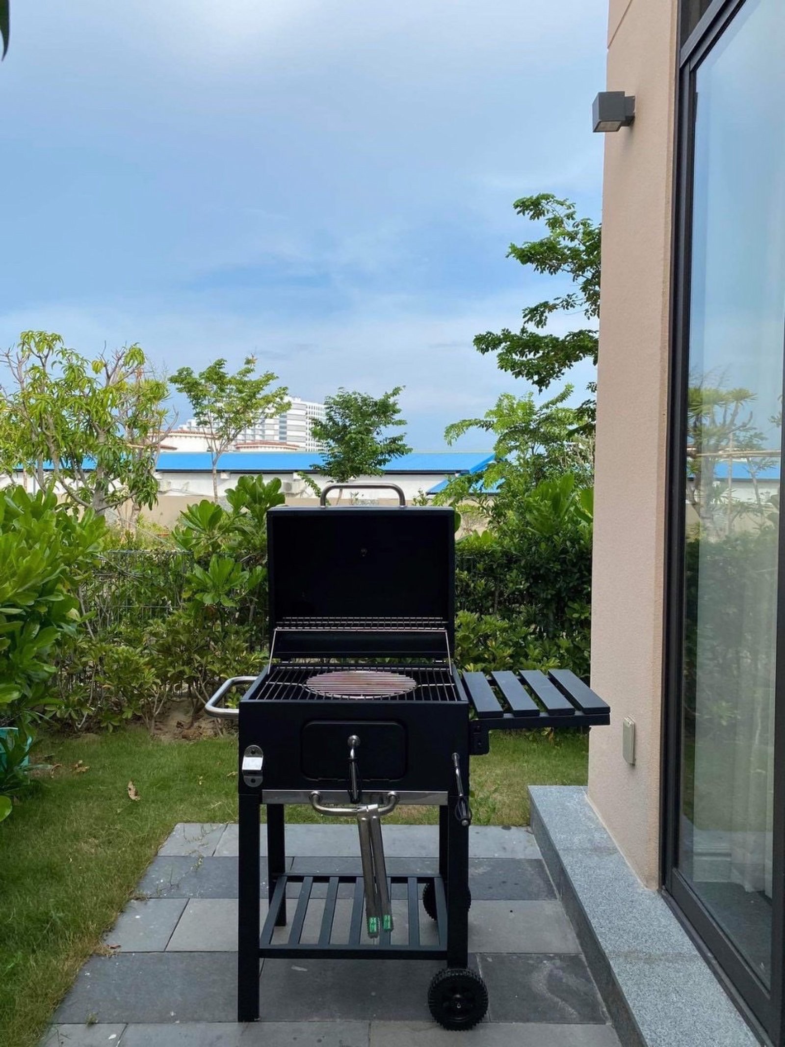 In-villa BBQ dinner setup at night