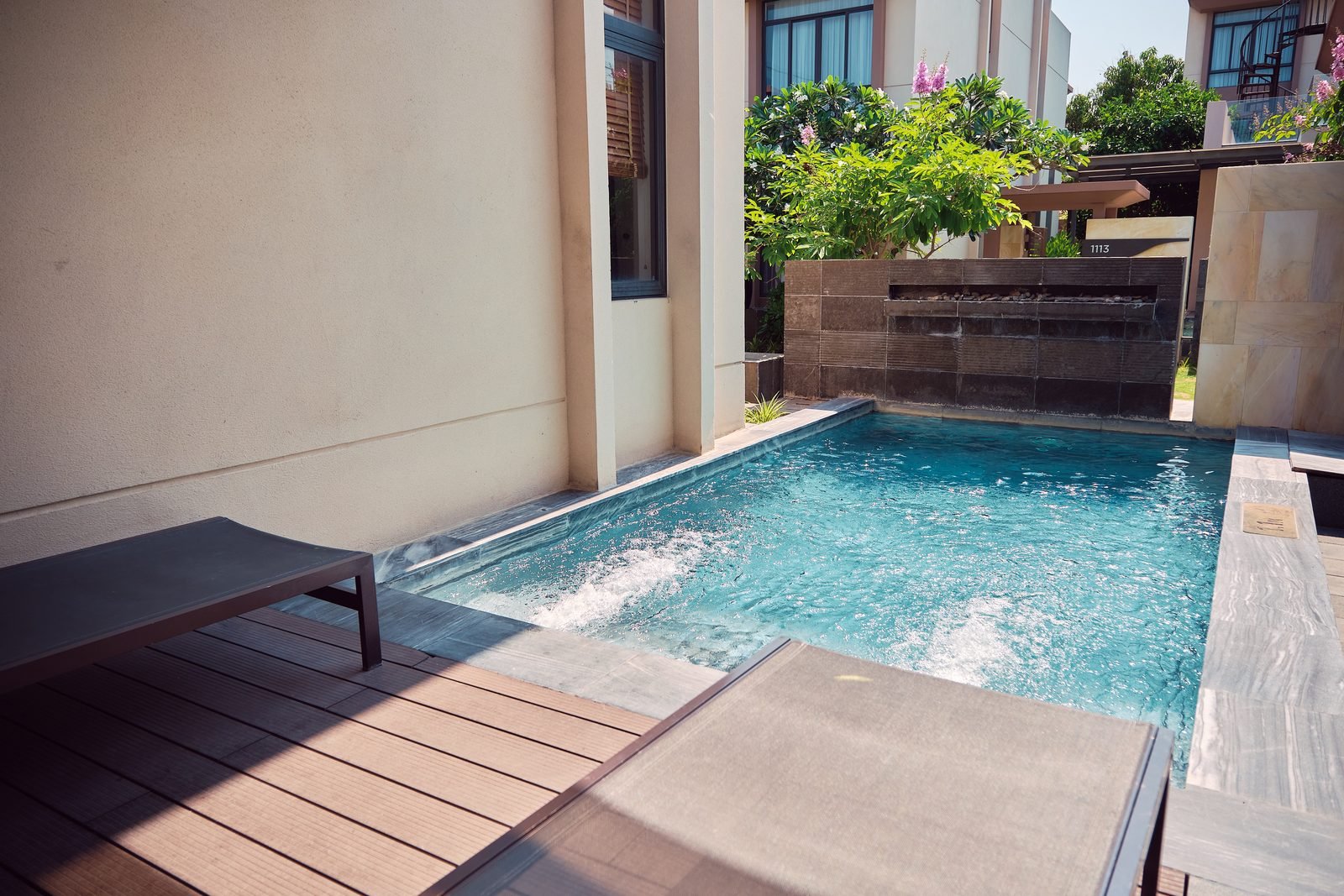 Plunge pool and garden wall of a Superior Pool Villa